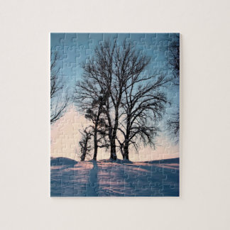 Winter trees on twilight blue sky jigsaw puzzle