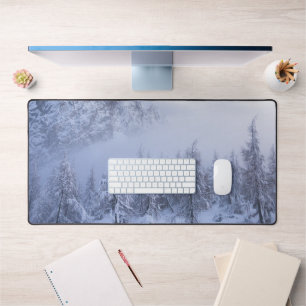 Winter wonderland, fog, spruce forest and mountain desk mat