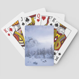Winter wonderland, fog, spruce forest and mountain playing cards