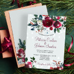 Winter wonderland lights Christmas floral wedding Invitation<br><div class="desc">Rustic winter seasonal wedding invitation template on a light dusty blue background featuring a beautiful burgundy and white peony roses bouquet with hunter pine green foliage, fir branches, red berries , strings of white magic twinkle lights and a chic dark red typography script. Easy to personalise with your details! The...</div>