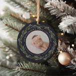 Winter Wreath | Baby's First Christmas Photo Ceramic Ornament<br><div class="desc">A perfect gift for new parents, this elegant Christmas ornament features front and back photos encircled by a wreath of dark green leaves and red berries. "[Name's] first Christmas" curves over the top of each photo, with the year beneath. Customise with a favourite photo on each side to create a...</div>