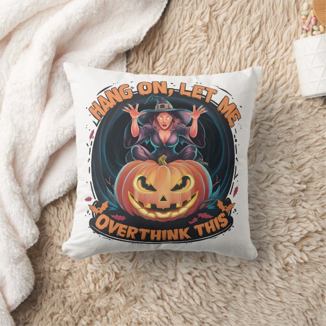 Witch conjuring thoughts by a glowing pumpkin cushion (Blanket)