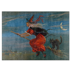 Witch Flying with Black Cat on Halloween Night  Cutting Board