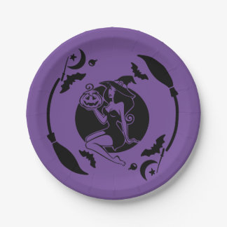 Witch holding a pumpkin paper plate