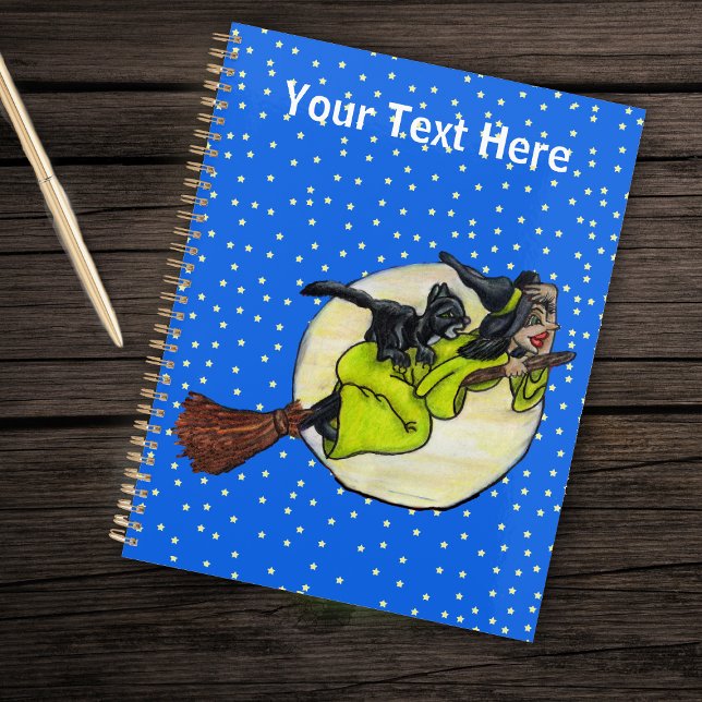 Witch Holding Hat Flying on Broom Past Full Moon Planner (Cute witch black cat flying on broom past full moon stars on dark blue planner.)