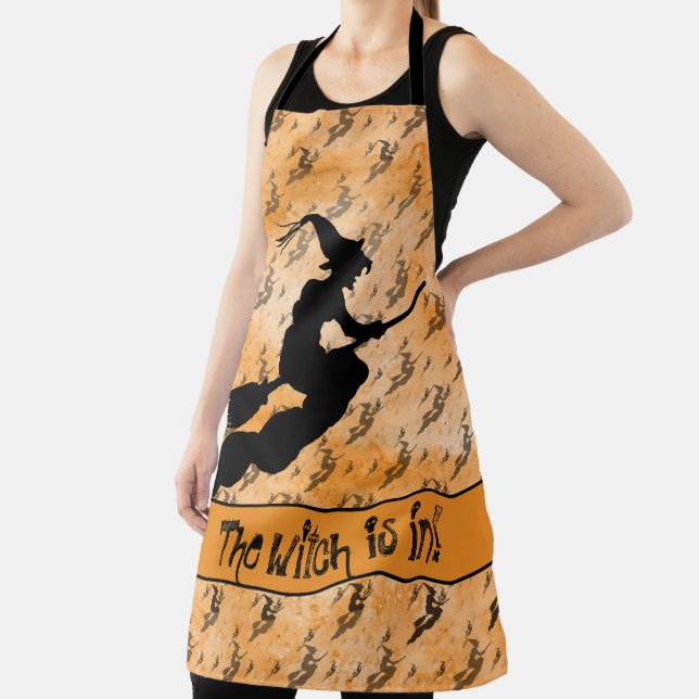 Witch is in: Halloween Witch Silhouette Orange Apron (Insitu)
