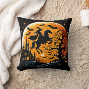 Witch riding a horse against a Halloween moon Cushion