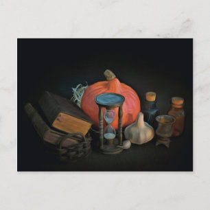 Witchery objects on a table in a dark room postcard