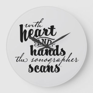 With Heart and Hands the Sonographer Scans Large Clock