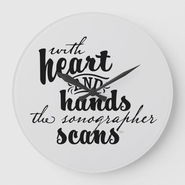 With Heart and Hands the Sonographer Scans Large Clock (Front)