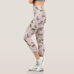 Wizard of Oz™ Wicked Witch™ Crystal Ball Pattern Capri Leggings<br><div class="desc">Add a touch of wickedly whimsical charm to your collection with this enchanting, vintage-inspired pattern featuring iconic characters from The Wizard of Oz. Showcasing the mysterious Wicked Witch alongside her winged monkeys, magical crystal ball, swirling skies, and hourglasses, this design captures the darker, spellbinding side of the beloved classic. The...</div>