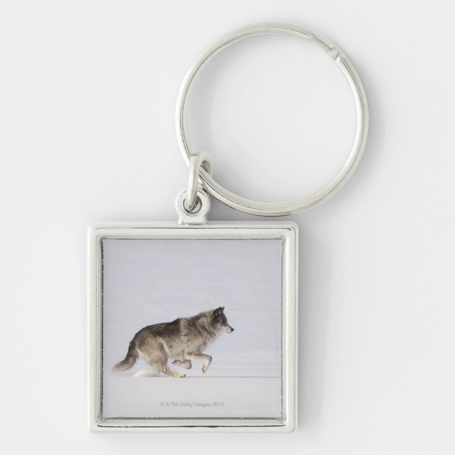 Wolf running in the snow 2 key ring (Front)