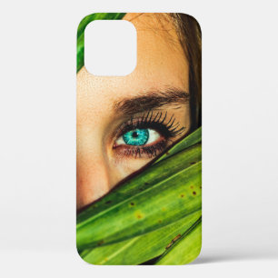Woman behind green leaves iPhone 12 case