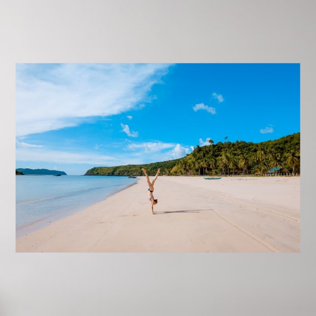 Woman doing acrobatic on seashore near mountain ra poster (Front)