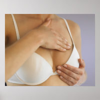 Woman doing breast self exam