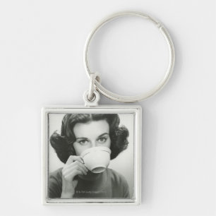 Woman Drinking Key Ring