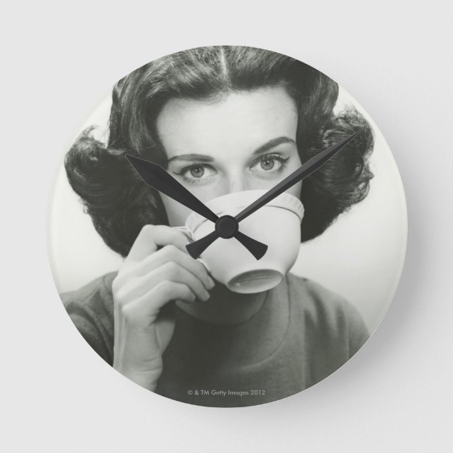 Woman Drinking Round Clock (Front)