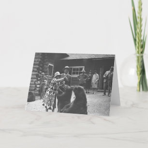 Woman feeding bears. card