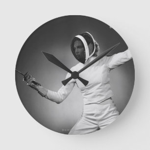 Woman Fencing Round Clock