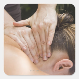 Woman getting spa treatment square sticker