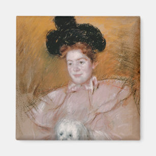 Woman holding a dog magnet