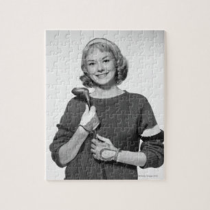 Woman Holding Golf Club Jigsaw Puzzle