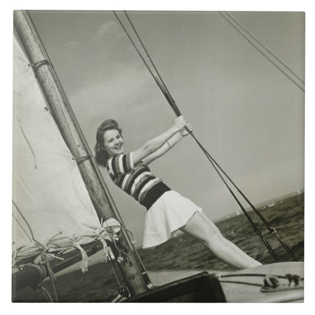 Woman Holding Rigging on Yacht Ceramic Tile (Front)