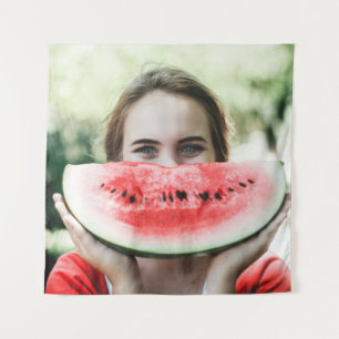 Woman holding sliced watermelon tapestry