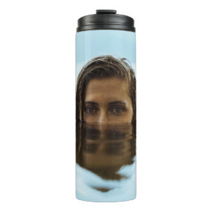 Woman in body of water in the morning thermal tumbler