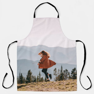 Woman in brown coat apron