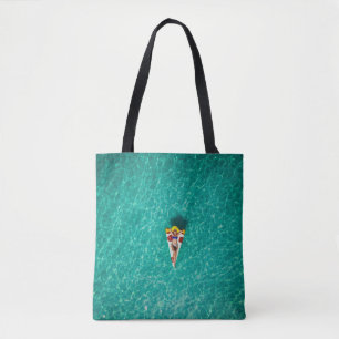 Woman in pizza float tote bag