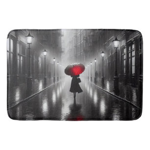 Woman In The Rain With Red Umbrella Bath Mat