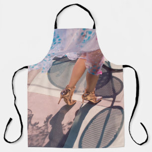 Woman in white pink and green floral skirt and bro apron