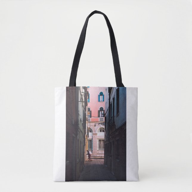WOMAN IN WHITE SHIRT AND BLACK PANTS WALKING ON SI TOTE BAG (Front)