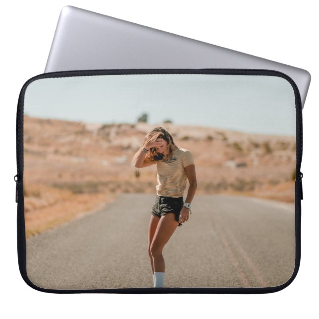 Woman in white shirt running on road in the mornin laptop sleeve (Front)