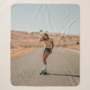 Woman in white shirt running on road in the mornin sherpa blanket