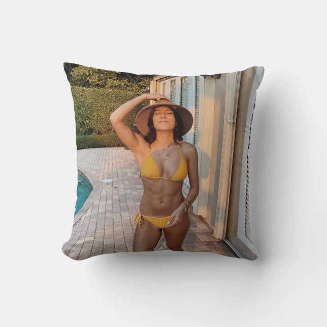 Woman in yellow bikini standing on brown brick flo cushion (Front)
