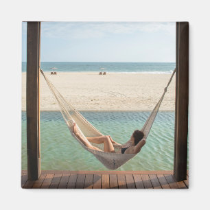 Woman Laying On A Hammock At A Small Hotel Magnet