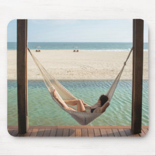 Woman Laying On A Hammock At A Small Hotel Mouse Pad