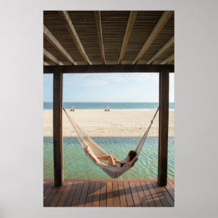 Woman Laying On A Hammock At A Small Hotel Poster