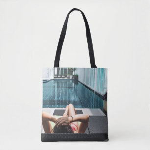 Woman laying on brown chaise lounge tote bag
