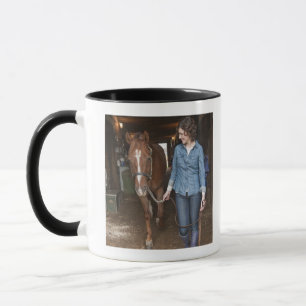 Woman leading horse mug