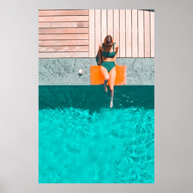 Woman lying beside swimming pool in the morning poster (Front)