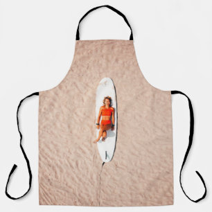 Woman lying on the surfboard apron