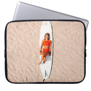 Woman lying on the surfboard laptop sleeve