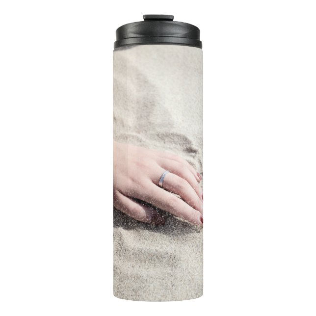 Woman lying on white sand thermal tumbler (Front)