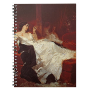 Woman on a red sofa notebook