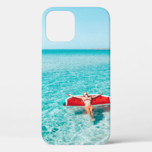 Woman on lilo in the sea water. Girl relaxing on i iPhone 12 Case