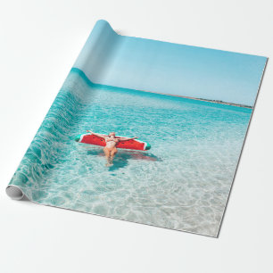 Woman on lilo in the sea water. Girl relaxing on i Wrapping Paper