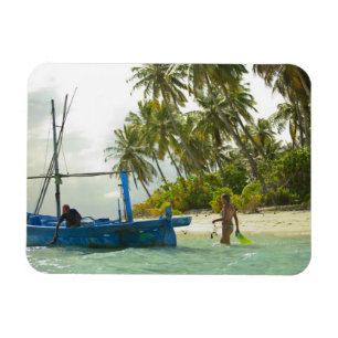 Woman on small traditional fishing boat, magnet